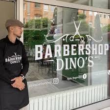 Dino's Barbershop Logo