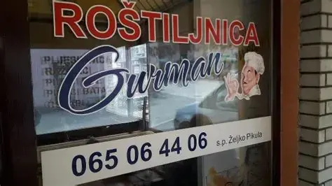 Roštiljnica GURMAN Logo